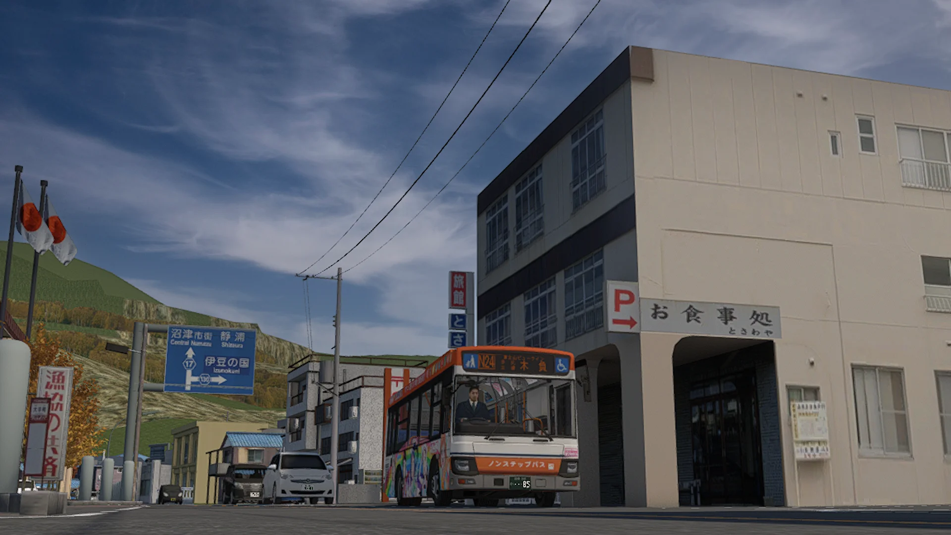 A bus beside Japanese harbour-side buildings in Project Numazu during openOMSI compatibility testing